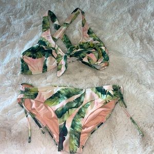 Slightly used size 16 girls bikini. Pink and green palm tree design.